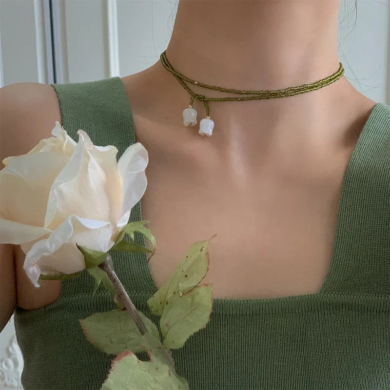 White Lily of The Valley Necklace Women Long Sweater Chains 2025 New Summer Green Necklace Pearl Flower Pendant Choker Jewelry