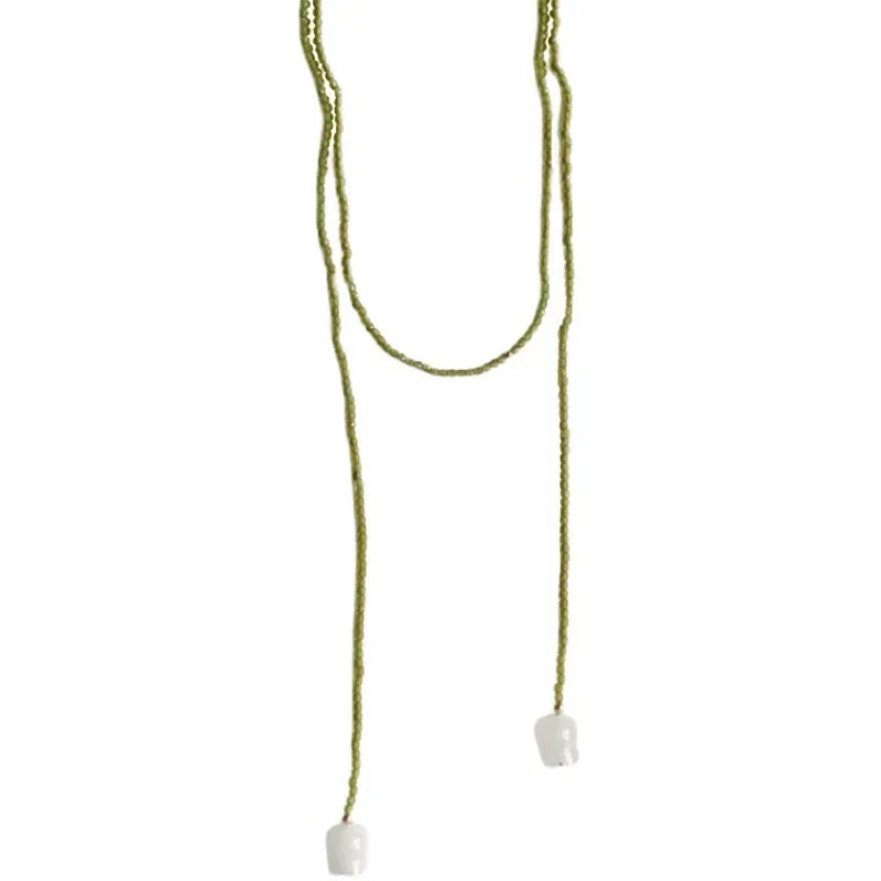 White Lily of The Valley Necklace Women Long Sweater Chains 2025 New Summer Green Necklace Pearl Flower Pendant Choker Jewelry