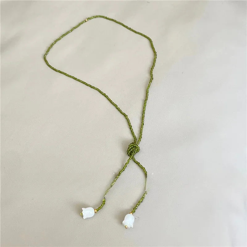 White Lily of The Valley Necklace Women Long Sweater Chains 2025 New Summer Green Necklace Pearl Flower Pendant Choker Jewelry