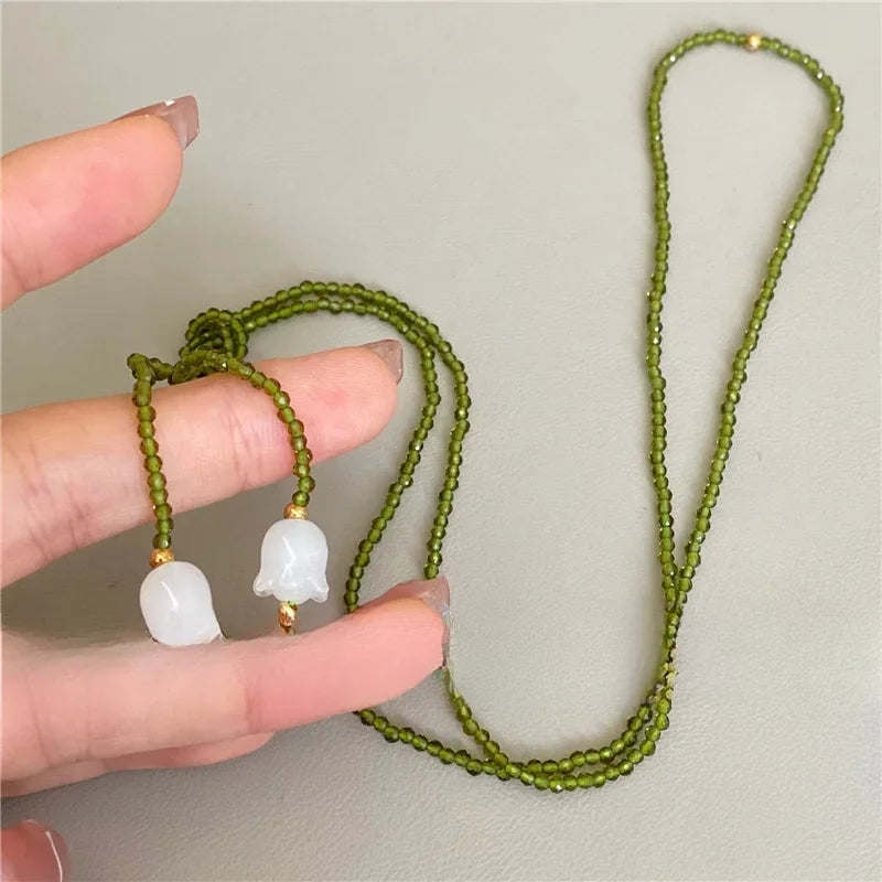 White Lily of The Valley Necklace Women Long Sweater Chains 2025 New Summer Green Necklace Pearl Flower Pendant Choker Jewelry