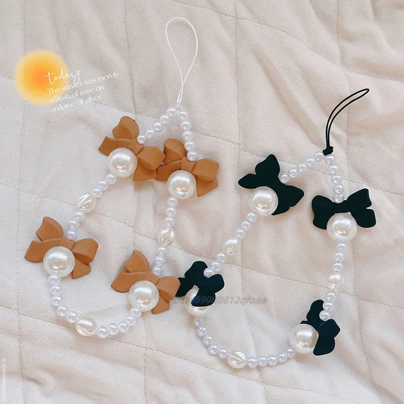 1pc Charm Bowknot Mobile Phone Chains For Women Girls Telephone Charm Strap Pink Black Acrylic Pearl Beaded Lanyard Jewelry Gift
